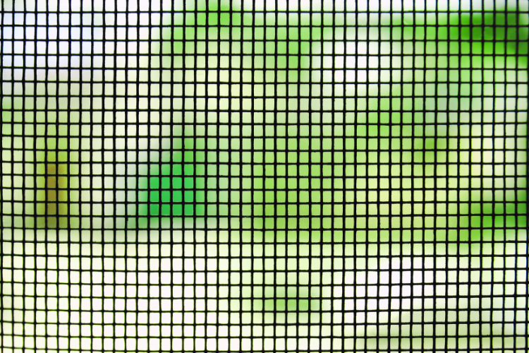Close-up of screen door mesh: check for tears or damage when measuring for replacement