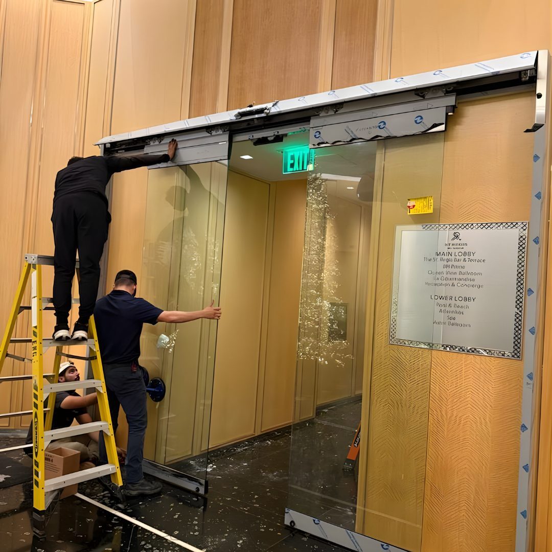 JDM technician performing commercial door repair